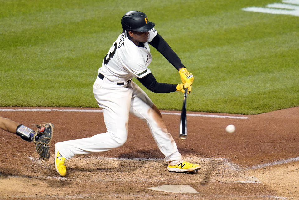 Pittsburgh Pirates' Ke'Bryan Hayes singles off Colorado Rockies relief pitcher Tyler Kinley during the eighth inning of a baseball game in Pittsburgh, Monday, May 23, 2022. (AP Photo/Gene J. Puskar)