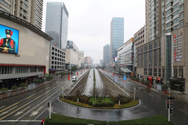 Street view after Wuhan government announced to ban non-essential vehicles in downtown area to contain coronavirus outbreak, on the second day of the Chinese Lunar New Year, in Wuhan