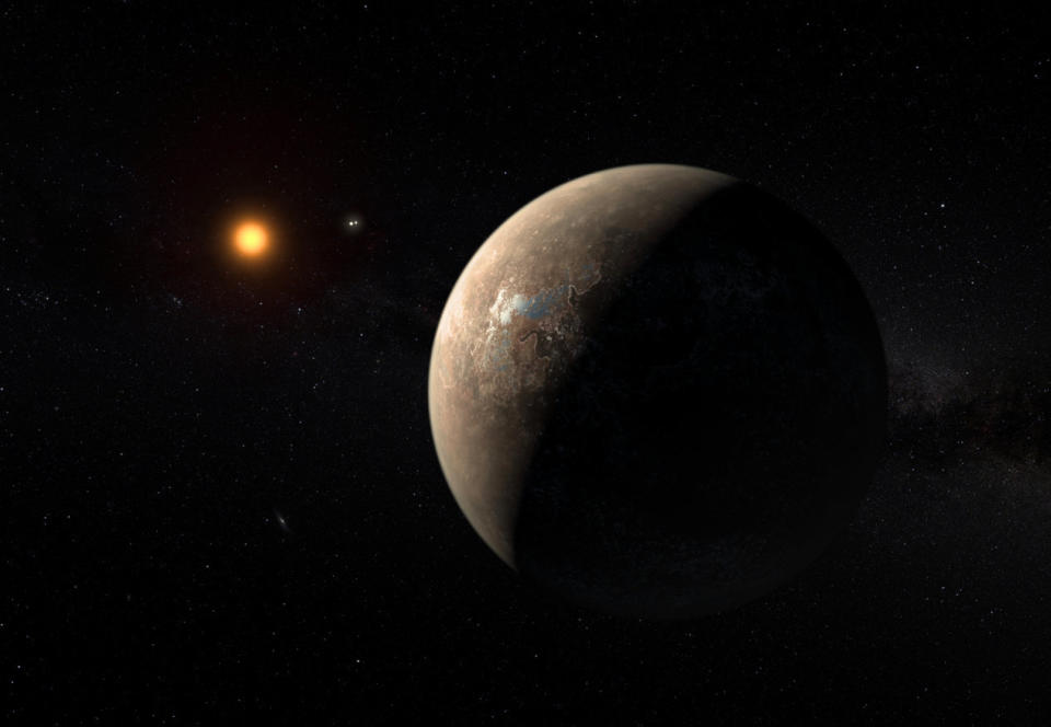 Artist's impression of exoplanet Proxima b orbiting the red dwarf star Proxima Centauri. The double star Alpha Centauri AB also appears in the image between the planet and Proxima Centauri.