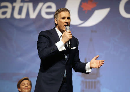 Conservative Party Leadership candidate Maxime Bernier, addresses crowd at the Conservative Party of Canada's final televised debate in Toronto, Ontario, April 26, 2017. REUTERS/Fred Thornhill