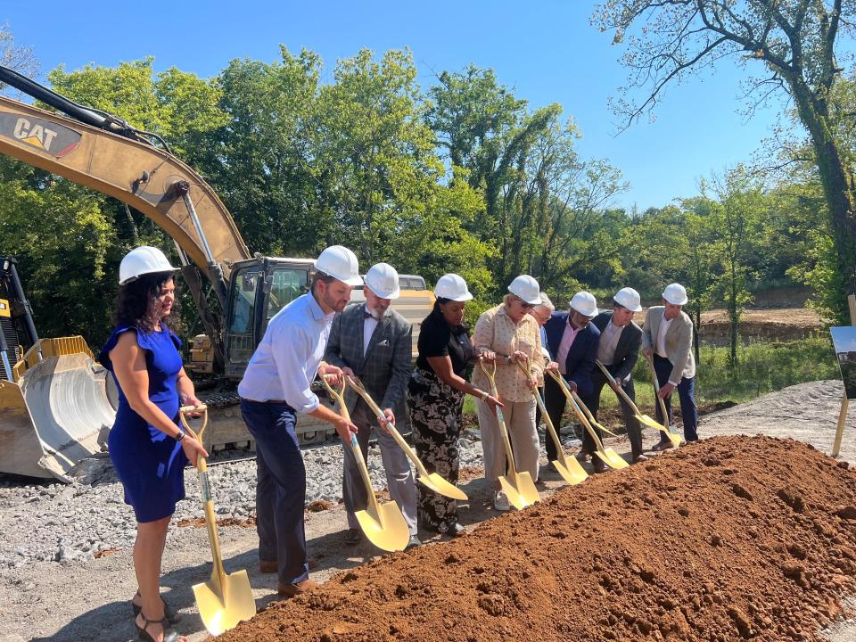 Several stakeholders hold ceremonial shovels during a groundbreaking event for an affordable housing development in East Nashville on Aug. 23, 2023 in Nashville, Tenn.