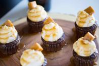 <p>Make a perfect chocolate cupcake even better with a touch of Guinness, Baileys and a caramel drizzle. </p><p>Get the <strong><a href="https://www.butterbeready.com/chocolate-stout-cupcakes-baileys-irish-buttercream/" rel="nofollow noopener" target="_blank" data-ylk="slk:Chocolate Stout Cupcakes with Irish Buttercream recipe;elm:context_link;itc:0;sec:content-canvas" class="link ">Chocolate Stout Cupcakes with Irish Buttercream recipe</a> </strong>from Butter Be Ready.  </p>