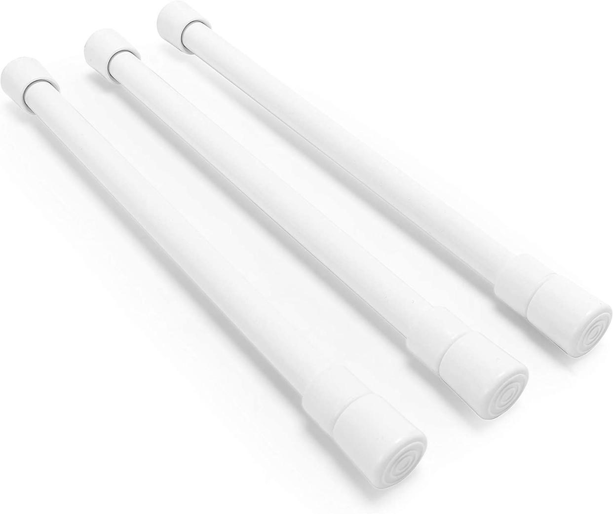 Pack of three spring-loaded bars used for keeping items in the fridge or cupboard in place in RV.