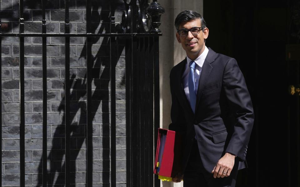 Rishi Sunak, the Prime Minister, is pictured leaving 10 Downing Street this morning - Kin Cheung/AP