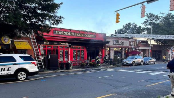 PHOTO: Ireland’s Four Courts Pub in Courthouse, Arlington, VA., caught fire after a car crashed into it on Aug. 12, 2022. (Xavier Halloun/@xthefirephoto/Twitter)