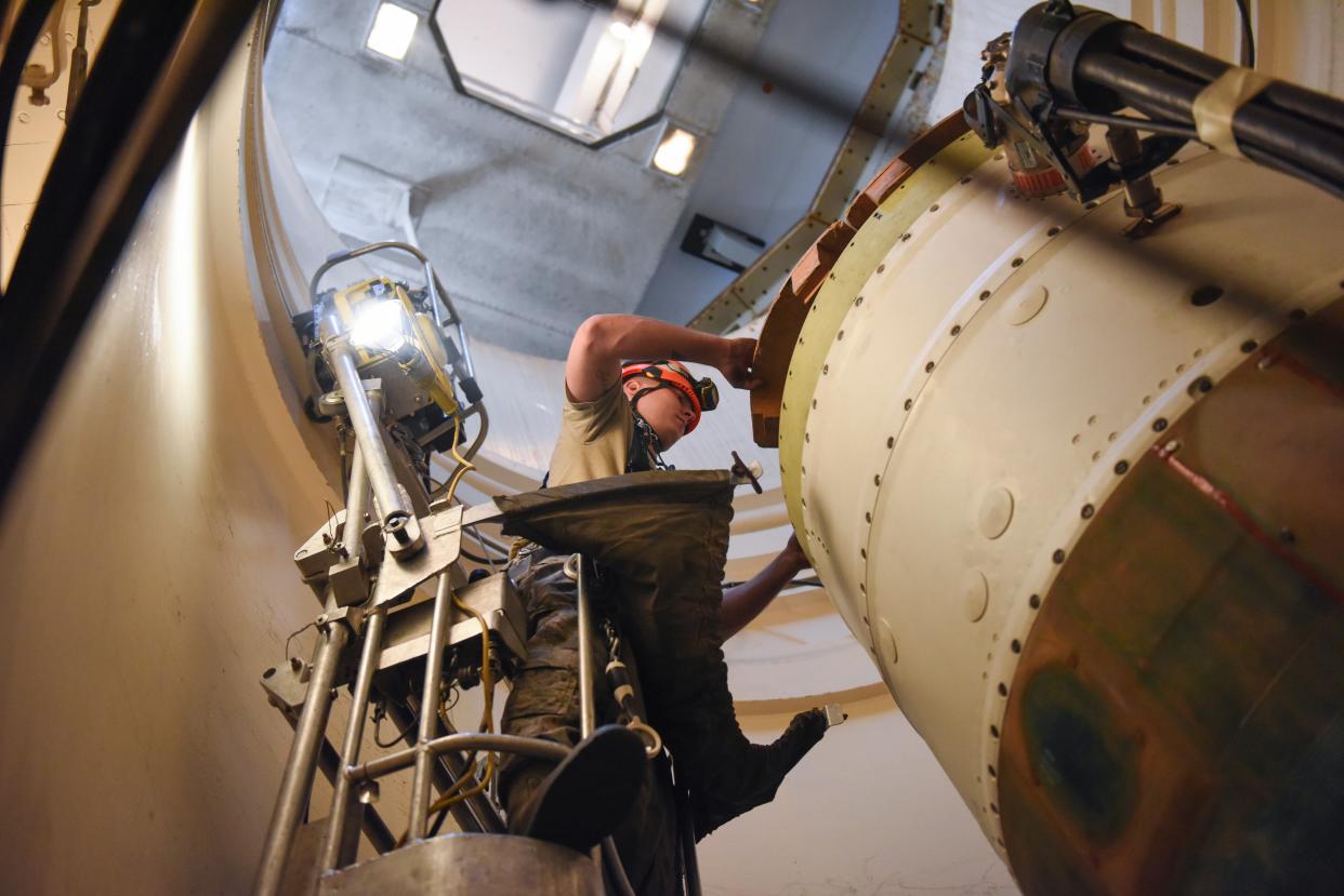 FILE - In this image provided by the U.S. Air Force, Airman 1st Class Jackson Ligon, 341st Missile Maintenance Squadron technician, prepares a spacer on an intercontinental ballistic missile during a Simulated Electronic Launch-Minuteman test Sept. 22, 2020, at a launch facility near Malmstrom Air Force Base in Great Falls, Mont. The U.S. says it is tracking a suspected Chinese surveillance balloon that has been spotted over U.S. airspace for a couple days but the Pentagon decided not to shoot it down due to risks of harm for people on the ground. One of the places the balloon was spotted was Montana, which is home to one of the nation's three nuclear missile silo fields at Malmstrom Air Force Base (AP)