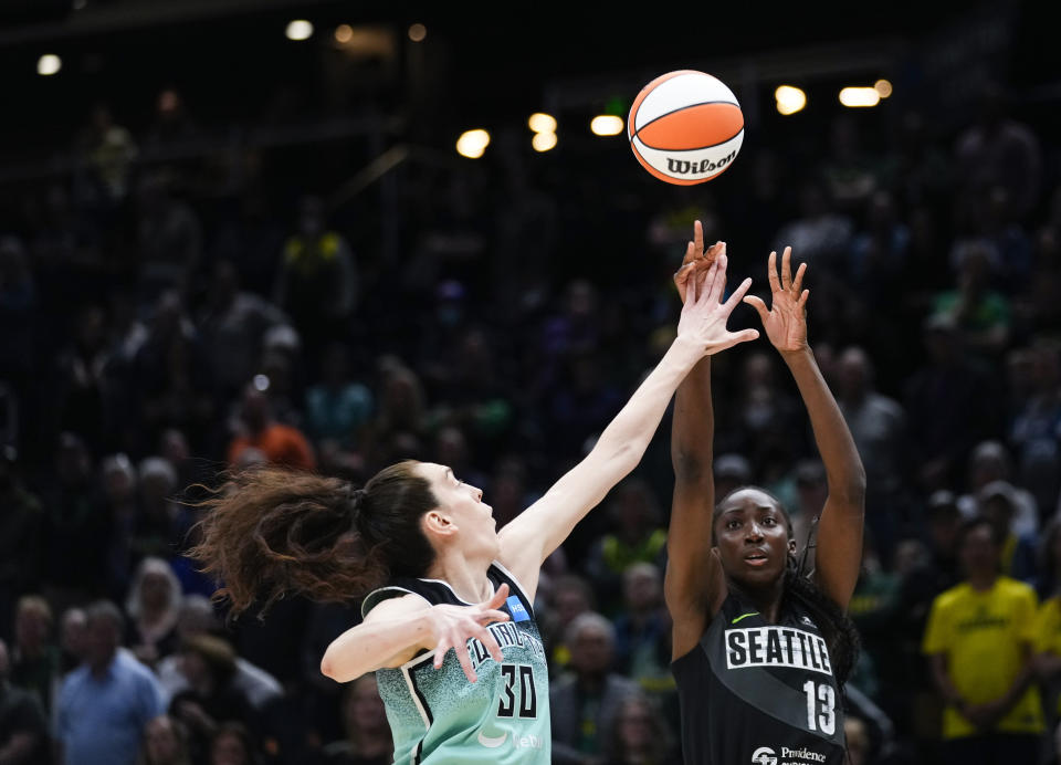 Seattle Storm center Ezi Magbegor (13) shoots over New York Liberty forward Breanna Stewart (30) during the first half of a WNBA basketball game Tuesday, May 30, 2023, in Seattle. (AP Photo/Lindsey Wasson)