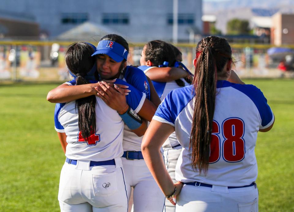 Indio's Sienna Rodriguez (13) embraces Julissa Alford (4) after their Division 6 CIF-SS quarterfinal loss in Indio, Calif., Thursday, May 9, 2024.