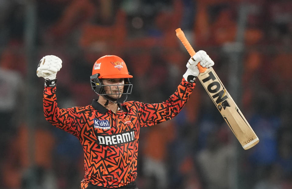 Sunrisers Hyderabad's Abhishek Sharma raises his bat to celebrate scoring fifty runs during the Indian Premier League cricket tournament between Sunrisers Hyderabad and Mumbai Indians in Hyderabad, India, Wednesday, March 27, 2024.(AP Photo/Mahesh Kumar A.)