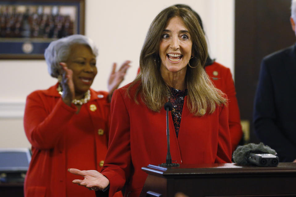 House speaker, Eileen Filler-Corn, D-Fairfax, right, applauds speaks during a press conference along with Senate president Pro-tempore, Sen. Louise Lucas, D-Portsmouth, as they participate in a press conference promoting the ERA at the Capitol, Monday Jan 27, 2020, in Richmond, Va. (AP Photo/Steve Helber)