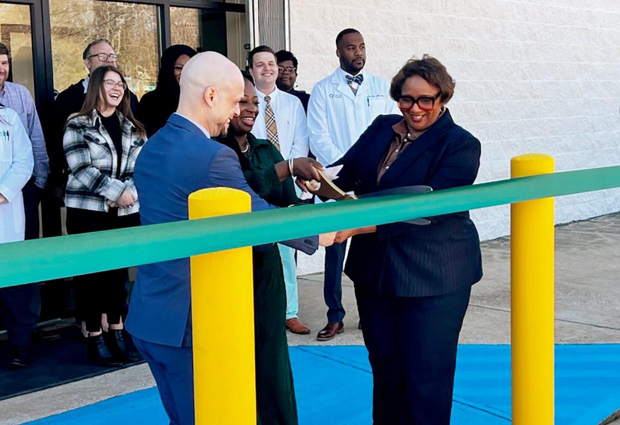 Dr. Sevetri Guillaume, right, helps cuts the ribbon during the grand opening ceremony of the Shreveport Oak Street Health center in the Cedar Grove neighborhood of Shreveport on January 31, 2024.