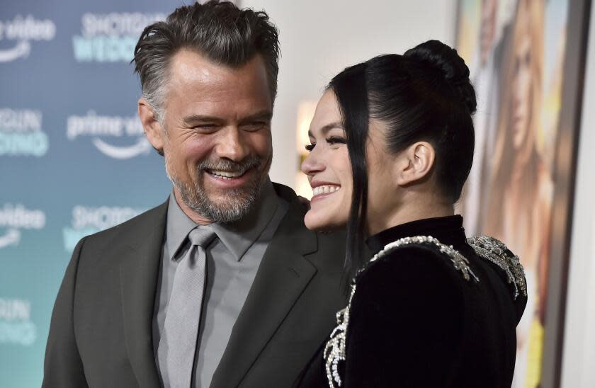 Josh Duhamel, left, and Audra Mari arrive at the premiere of "Shotgun Wedding," Wednesday, Jan. 18, 2023, at TCL Chinese Theatre in Los Angeles. (Photo by Jordan Strauss/Invision/AP)