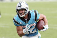 Carolina Panthers running back Christian McCaffrey (22) rushes for a touchdown against the Tampa Bay Buccaneers during the second half of an NFL football game Sunday, Sept. 20, 2020, in Tampa, Fla. The Panthers are eager to get Christian McCaffrey back on the field after he has missed four games with a high ankle sprain. (AP Photo/Mark LoMoglio)