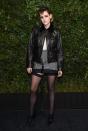 <p>The Twilight star showed off her stockings at the Charles Finch and Chanel Pre-Oscar Awards Dinner in March 2018.</p>