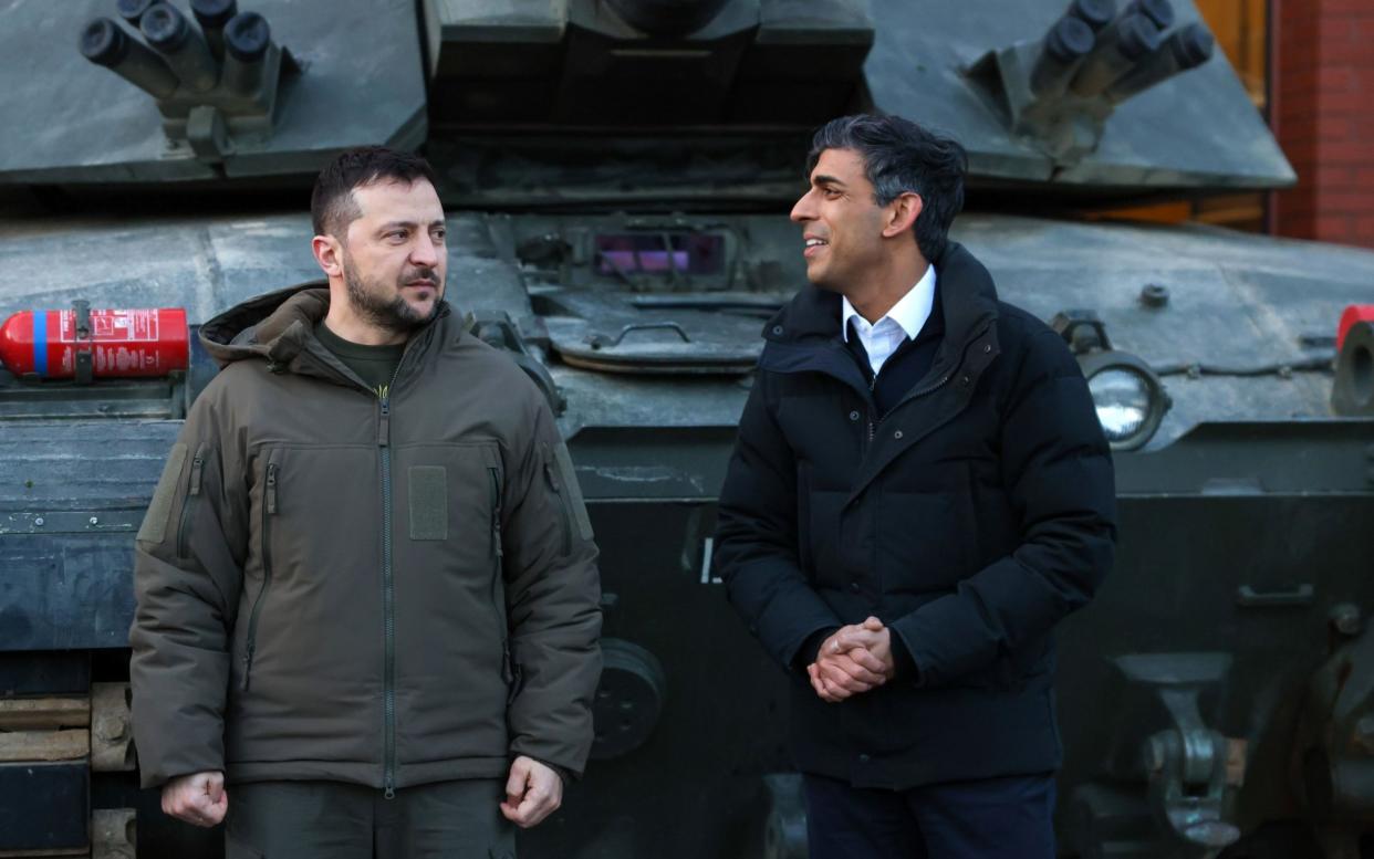 Rishi Sunak and Volodymyr Zelensky standing in front of a tank - HOLLIE ADAMS/POOL/EPA-EFE/Shutterstock
