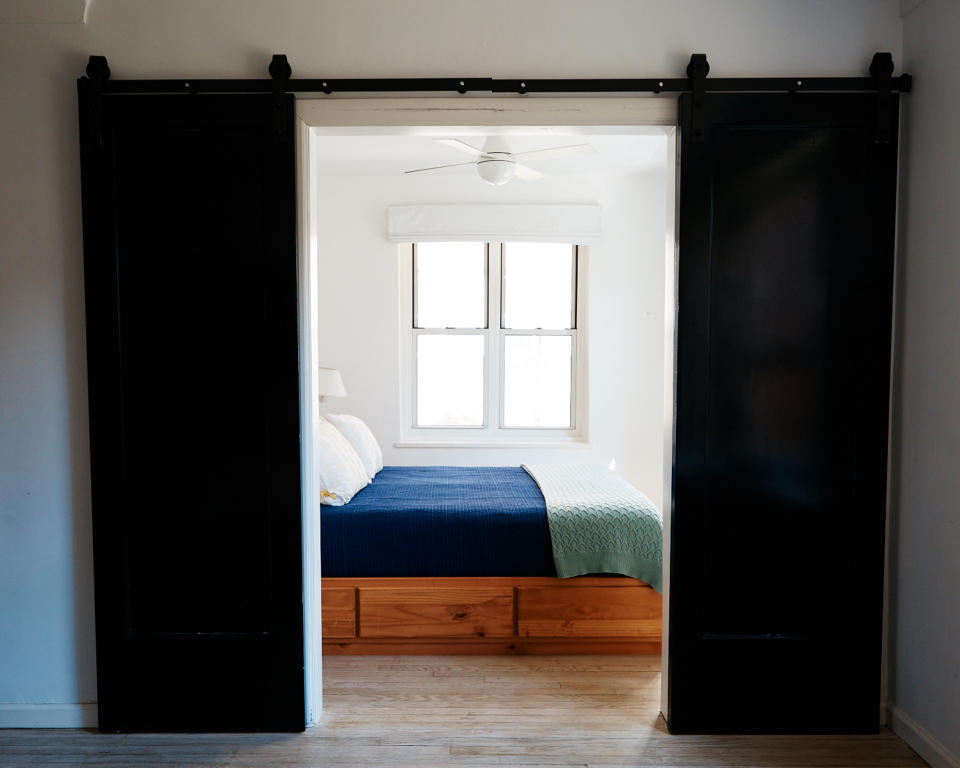 In small spaces choose a bed with built-in drawers