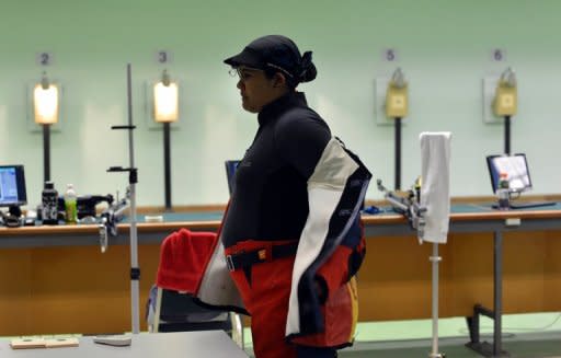 Malaysia's Nur Suryani Mohamad Taibi during a practice session at the Subang Jaya shooting field near Kuala Lumpur. At nearly eight months, the 10-metre air rifle competitor will surely be one of the most heavily pregnant Olympians in history
