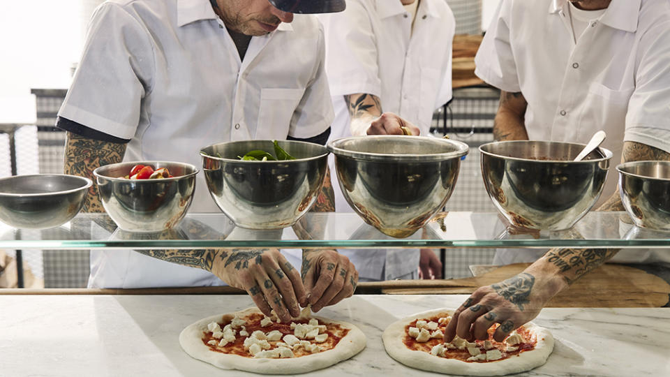 The pizza-making process at Una Pizza Napoletana - Credit: Mark Weinberg