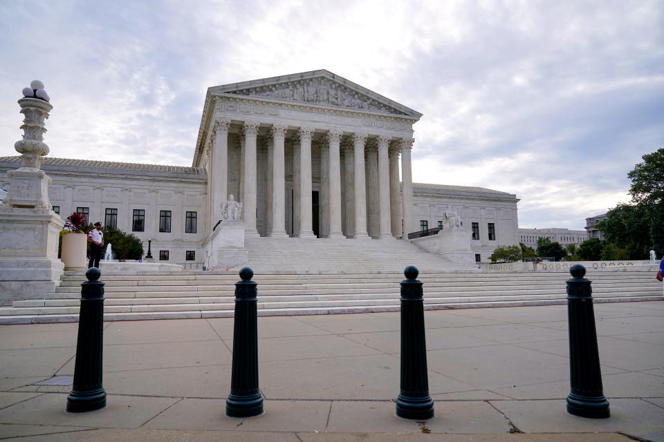 In this Oct. 4, 2021 photo, the Supreme Court is seen on the first day of the new term, in Washington.