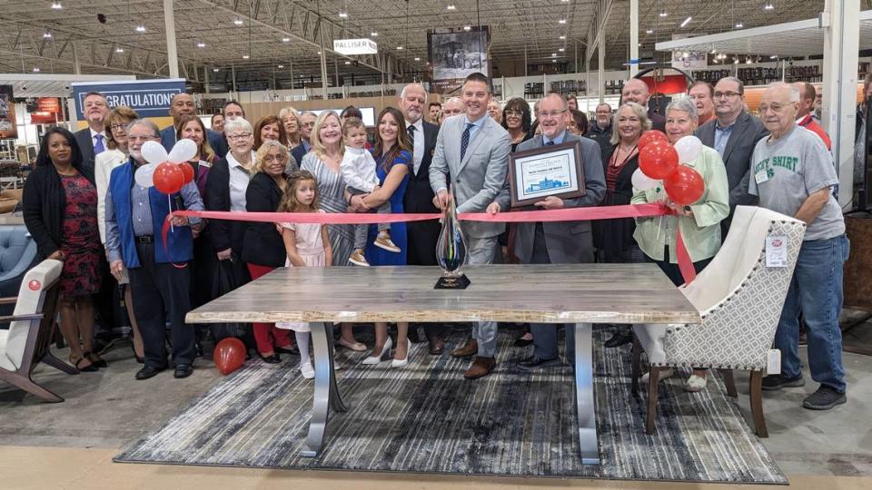 Mark Mueller gets ready to cut the ribbon at Mueller Furniture & Mattress Warehouse Showroom in Fairview Heights.