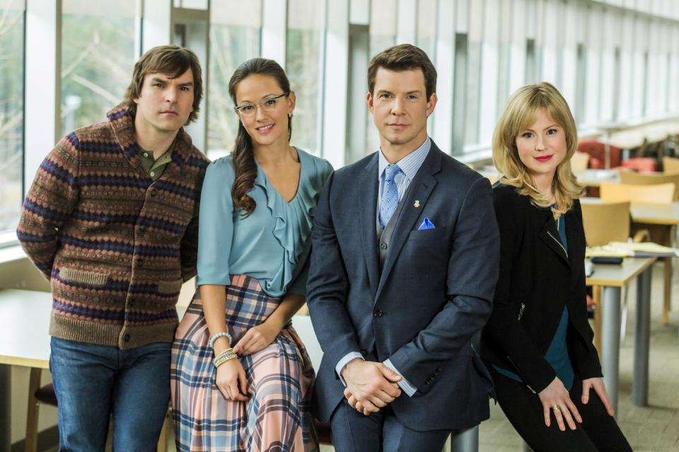 This photo provided by Hallmark Channel shows, from left, Geoff Gustafson (“Norman Dorman”), Crystal Lowe (“Rita Haywith”), Eric Mabius (“Oliver O’Toole) and Kristin Booth (“Shane McInerny”), on the set of the TV series, "Signed, Sealed, Delivered." The writer-producer Martha Williamson, who produced “Touched by an Angel,” returns to TV with the new Hallmark Channel show, debuting Sunday, April 20, 2014. (AP Photo/Hallmark Channel, Katie Yu) **MANDATORY CREDIT**