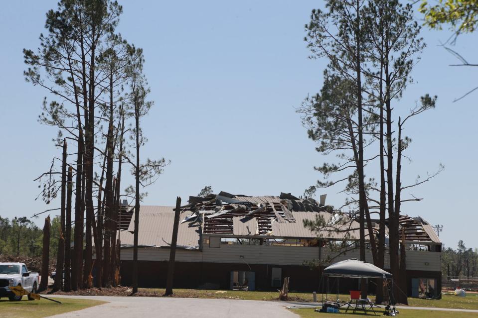 A photograph captures the damage of Hendrix Park Gym after a tornado tore through it in April 2022.