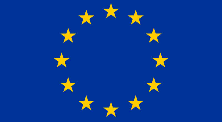 the European Union flag, a circle of gold stars on a navy blue background