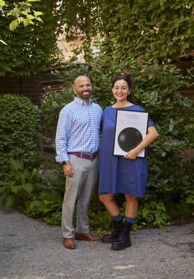 Winner of the Food Planet Prize 2024: C40 Food Systems. Zachary Tofias, Director of Food and Waste, and Stefania Amato, Head of Food Strategy at C40 Cities Climate Leadership Group posing with the winner's diploma.