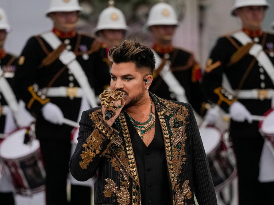 Adam Lambert and Queen opening the jubilee concert with a performance of ‘We Will Rock You’ (AP)