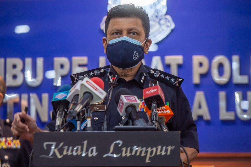 KL Police Chief Commissioner Datuk Azmi Abu Kassim Datuk Azmi Abu Kassim speaks to reporters at the Kuala Lumpur police headquarters June 11, 2021. — Picture by Shafwan Zaidon