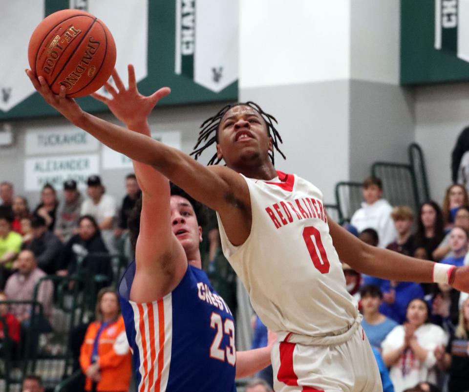 Hamilton's Christian Davis drives past Chester's Dylan Perez during their NYSPHSAA sub-regional game at Yorktown High School March 4, 2022. Hamilton won 76-51.