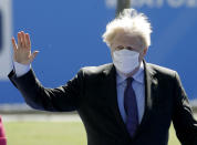 British Prime Minister Boris Johnson arrives for a NATO summit at NATO headquarters in Brussels, Monday, June 14, 2021. U.S. President Joe Biden is taking part in his first NATO summit, where the 30-nation alliance hopes to reaffirm its unity and discuss increasingly tense relations with China and Russia, as the organization pulls its troops out after 18 years in Afghanistan. (Olivier Hoslet, Pool via AP)