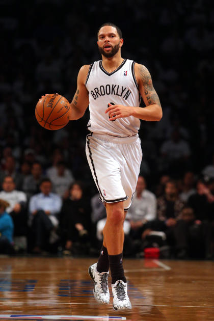 May 2, 2014; Brooklyn, NY, USA; Brooklyn Nets point guard Deron Williams (8) controls the ball against the Toronto Raptors during the third quarter of game six of the first round of the 2014 NBA Playoffs at Barclays Center. The Nets defeated the Raptors 97-83. (Brad Penner-USA TODAY Sports)