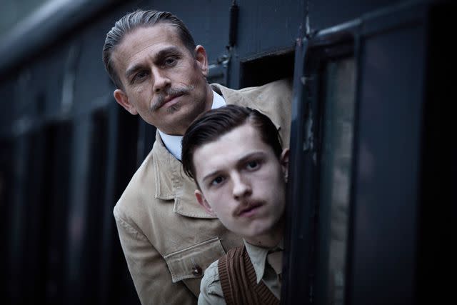 <p>Aidan Monaghan/Bleecker Street Media/Everett</p> Charlie Hunnam and Tom Holland in 'The Lost City of Z'