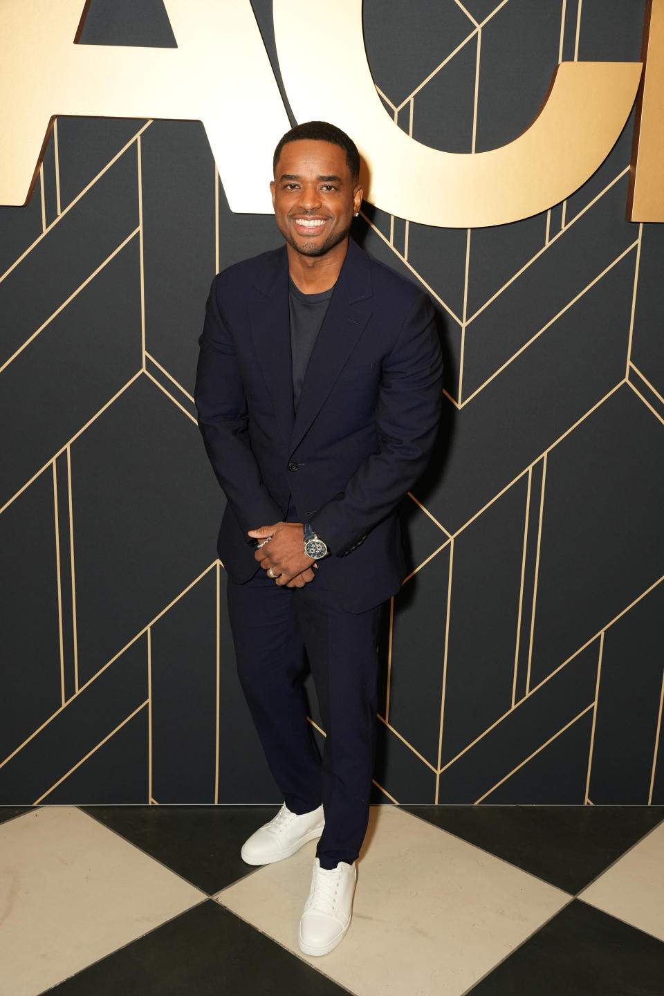 Larenz Tate smiling.