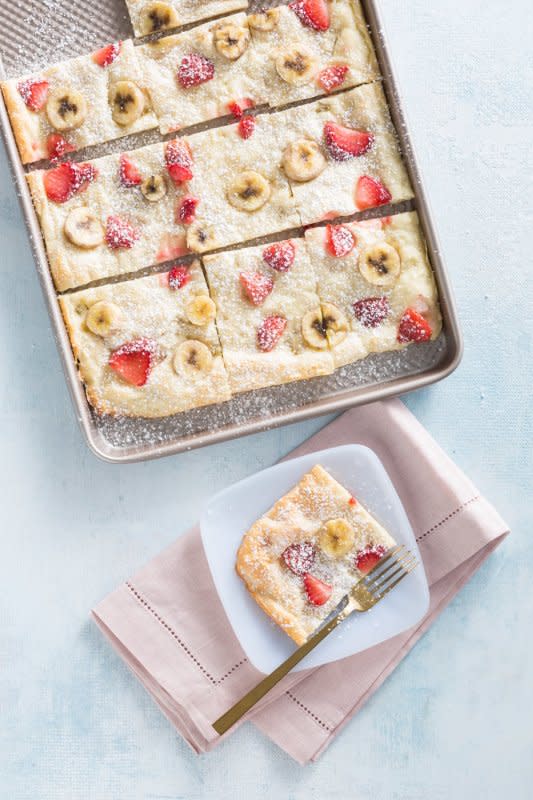 <p>Breakfast for a crowd is fast and no-sweat with these easy-ﬁx pancakes that can be served right from the sheet pan. Fruit and fat-free yogurt add sweetness with no additional sugar.</p><p><strong>Get the recipe: <a href="/842595/rosemaryblack/strawberry-banana-sheet-pan-pancakes/" data-ylk="slk:Strawberry-Banana Sheet Pan Pancakes;elm:context_link;itc:0;sec:content-canvas" class="link rapid-noclick-resp">Strawberry-Banana Sheet Pan Pancakes</a></strong></p>