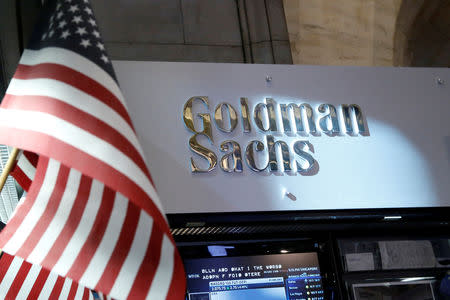 FILE PHOTO: A view of the Goldman Sachs stall on the floor of the New York Stock Exchange July 16, 2013. REUTERS/Brendan McDermid/File Photo