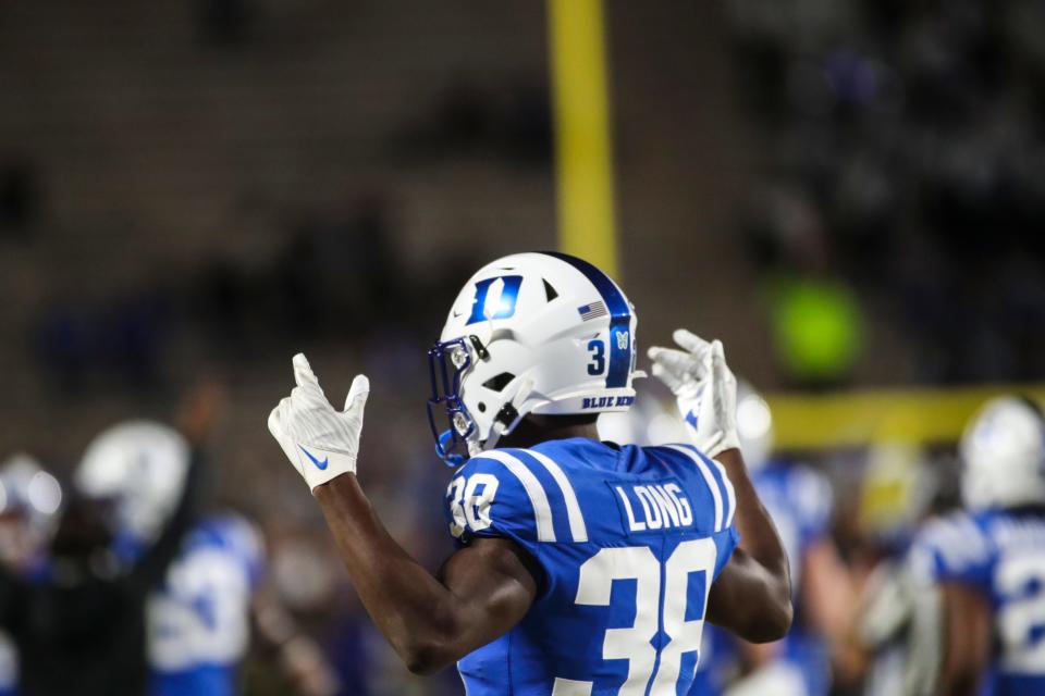 Nov 18, 2021; Durham, North Carolina, USA;  Duke Blue Devils cornerback Dominique Long (38) celebrates a touchdown during the 1st half of the game against the Louisville Cardinals at Wallace Wade Stadium.