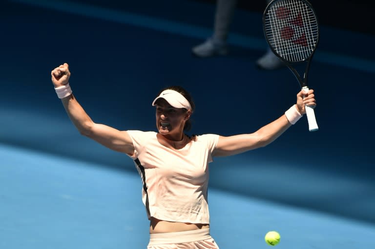 France's Caroline Garcia celebrates after beating Czech Republic's Marketa Vondrousova in their Australian Open second round match, in Melbourne, on January 18, 2018