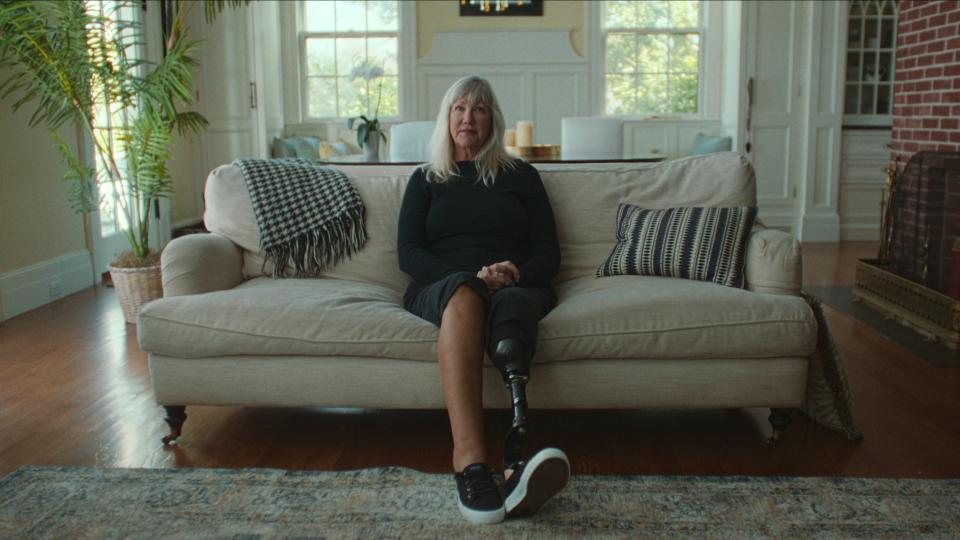 Karen McWatters, who lost a leg in the attack, appears in a scene from the Netflix documentary "American Manhunt: The Boston Marathon Bombing."