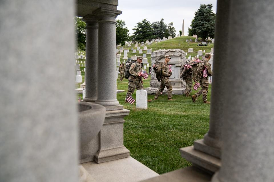 Members of the 3rd U.S. Infantry Regiment also known as “The Old Guard” take part in a joint service “Flags-In” ceremony at Arlington National Cemetery on Thursday, May 25, 2023.