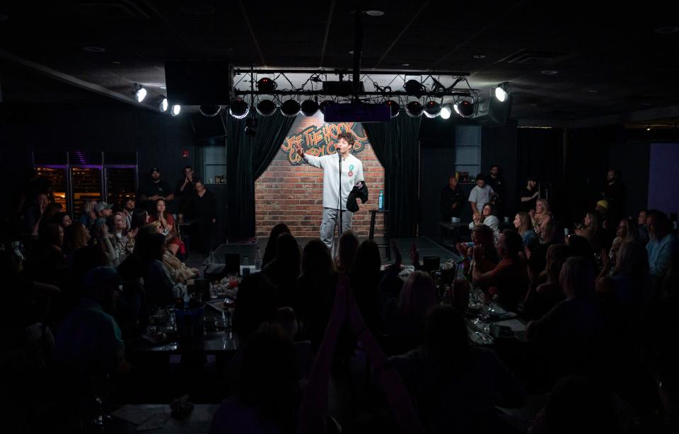 Comedian Matt Rife, along with other comedians, performs a sold-out show at Off the Hook Comedy Club in Naples, Florida, on Dec. 14, 2023.