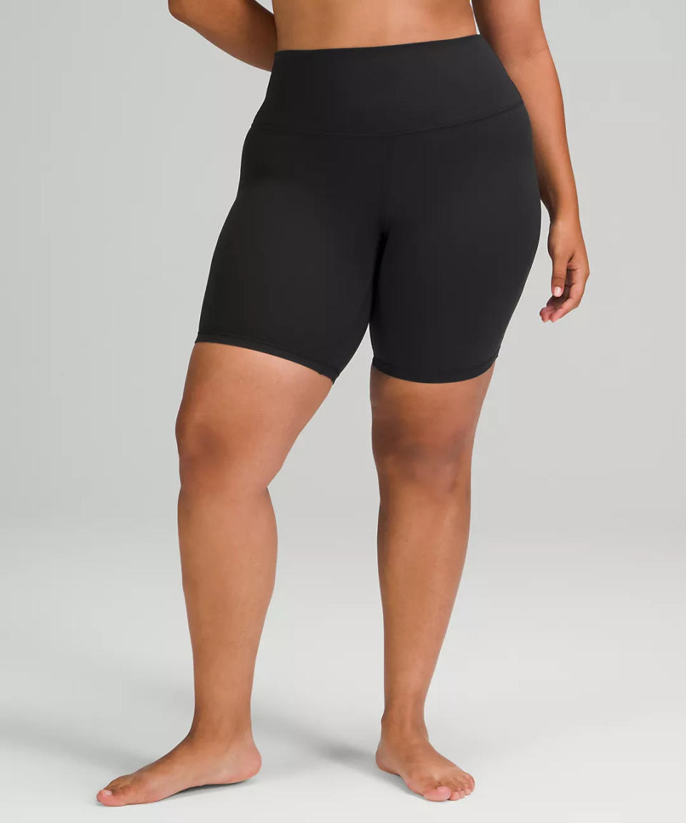 woman wears black lululemon Align High-Rise Short 8