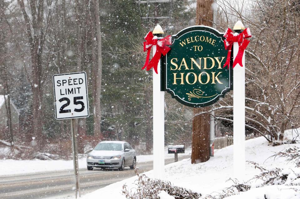 A sign welcoming visitors to Sandy Hook in Newtown