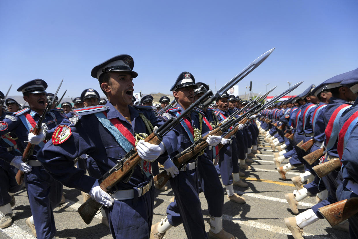 Huthi soldiers march during an official military parade marking the ninth anniversary of the Huthi takeover of the capital, Sanaa, on September 21, 2023. (Photo by MOHAMMED HUWAIS / AFP) (Photo by MOHAMMED HUWAIS/AFP via Getty Images)