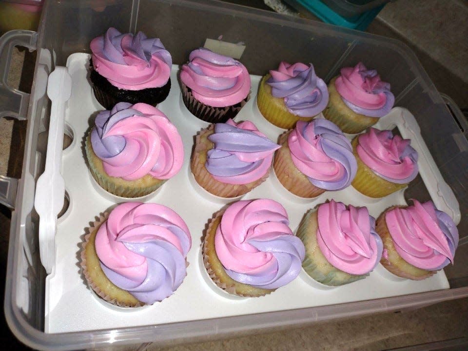 Daughter Lovina had fun decorating Mother’s Day cupcakes that daughter Elizabeth made to take to church.