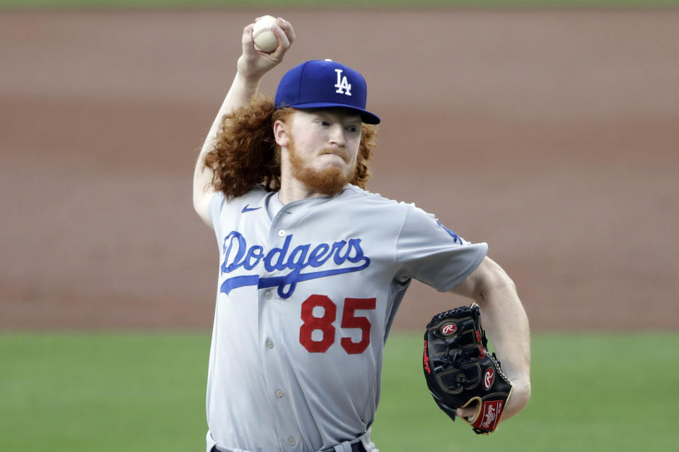 Los Angeles Dodgers starting pitcher Dustin May works against a San Diego Padres batter during the first inning of a baseball game Tuesday, Aug. 4, 2020, in San Diego. (AP Photo/Gregory Bull)