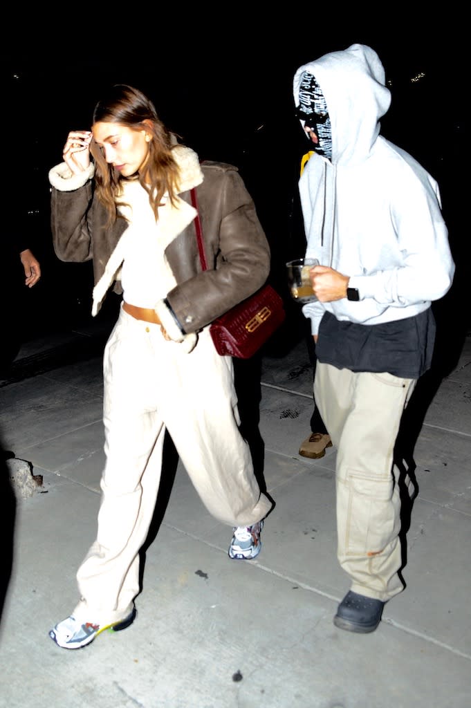 Justin and Hailey Bieber out and about in West Hollywood, Calif., while wearing Balenciaga footwear on Jan. 27, 2022. - Credit: PhotosByDutch / SplashNews.com