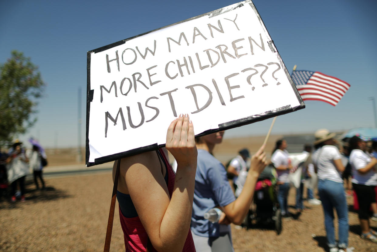 Protesters at the U.S. Border Patrol facility in Clint, Texas, where lawyers reported that detained migrant children were held unbathed and hungry, on June 27. (Photo: Mario Tama/Getty Images)