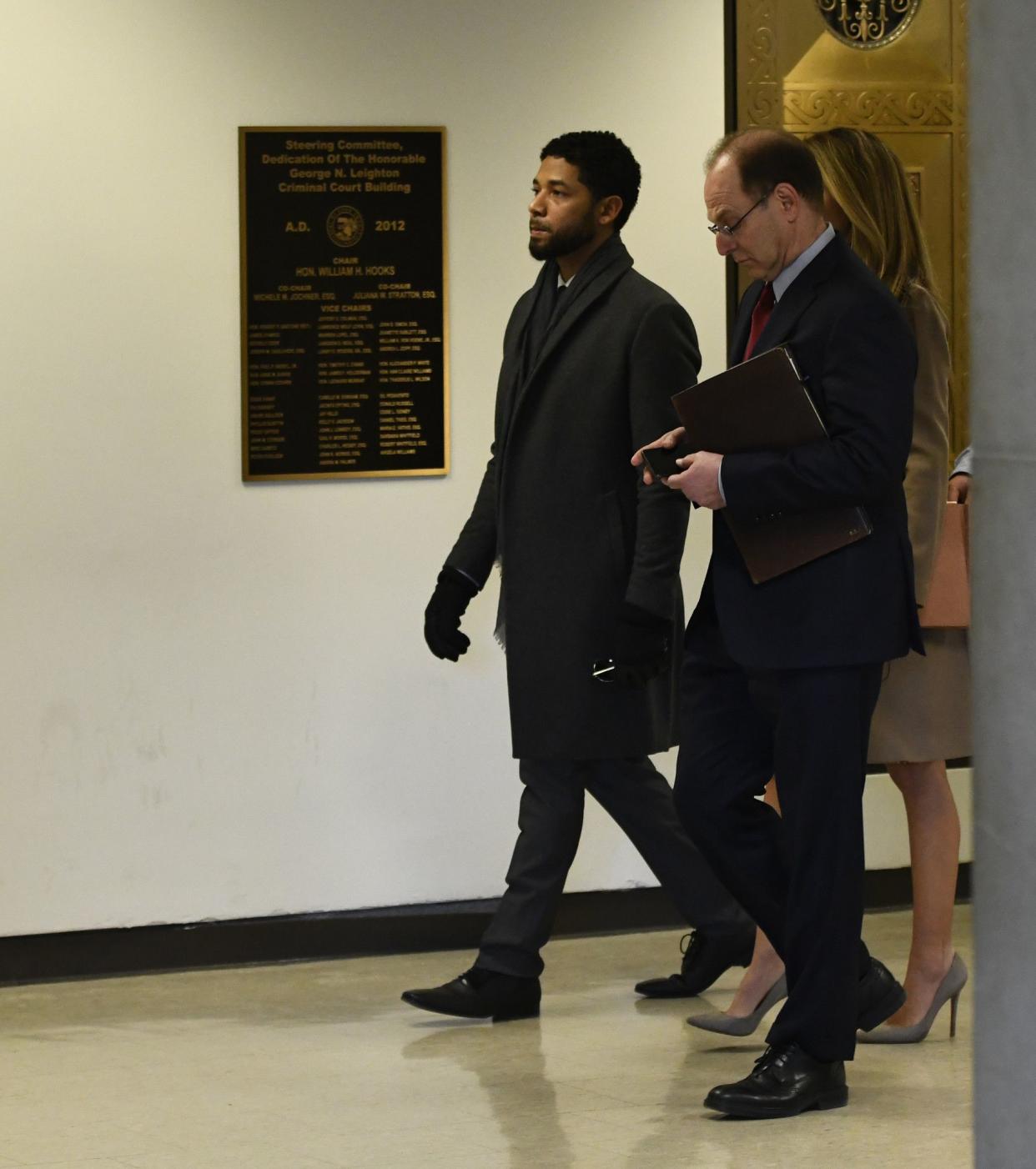 Empire actor Jussie Smollett enters the courtroom at Leighton Criminal Court Building on Tuesday, Mar. 12, 2019, in Chicago. A grand jury indicted Smollett last week on 16 felony counts.